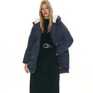 Elegant Dark Blue Puffer Coat with White Trim